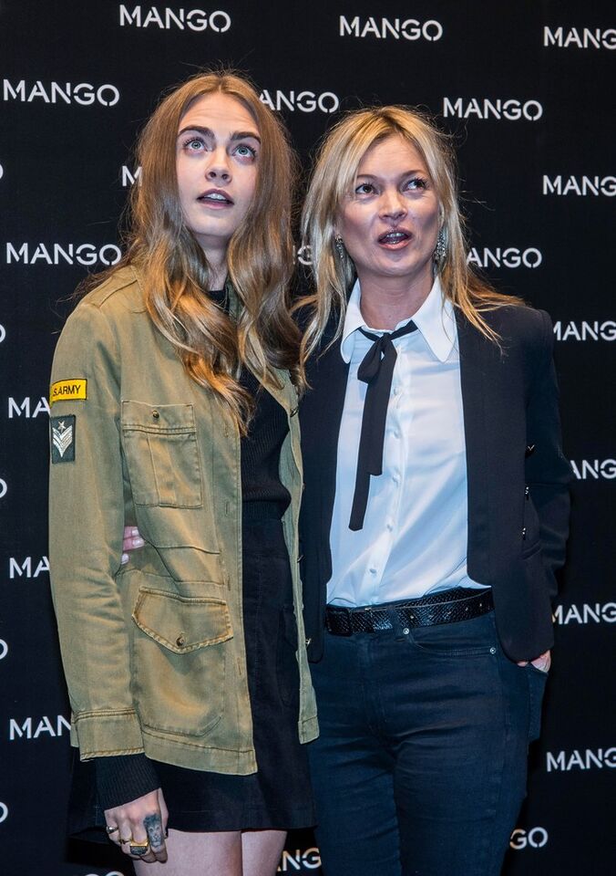 Las modelos Cara Delevingne y Kate Moss, en una aparición comercial para Mango. Foto AP